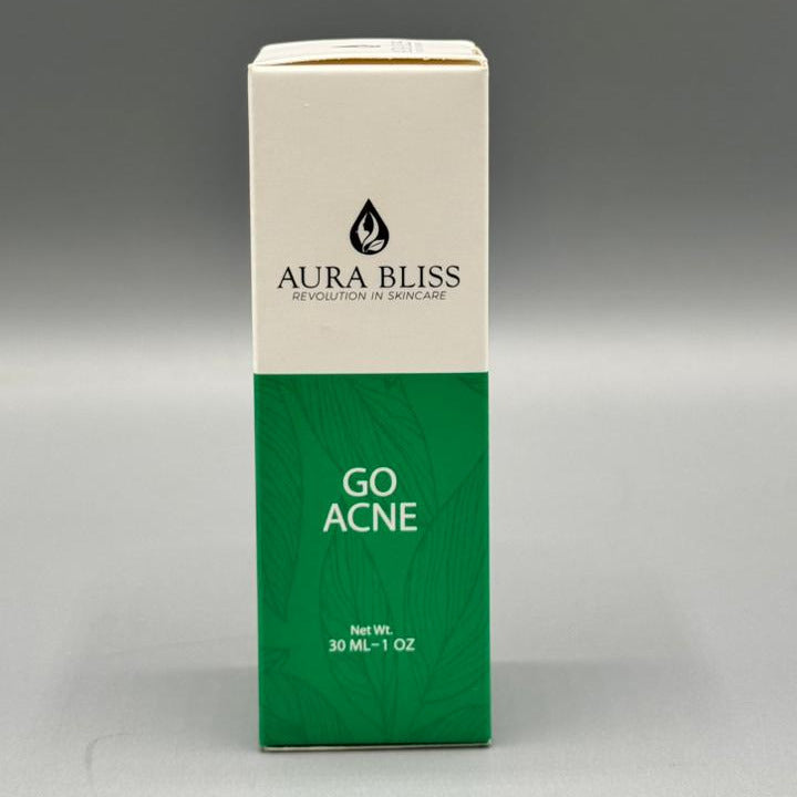 Aura Bliss Go Acne product packaging on a gray background
